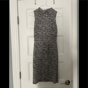 Black white and gold work dress. Tight fighting. Super cute